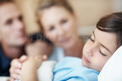 Buy stock photo Child, sleeping and hospital bed with sick patient for recovery, immune system support and pediatrics. Girl, diagnosis facility and parents in clinic for rest treatment, service or medical consulting
