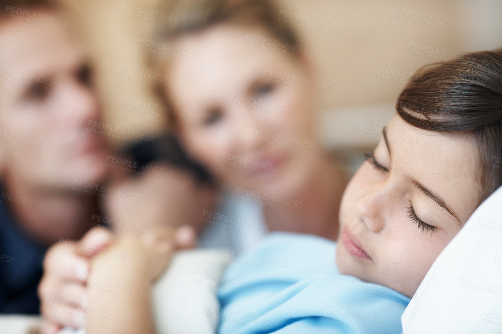 Buy stock photo Child, sleeping and hospital bed with sick patient for recovery, immune system support and pediatrics. Girl, diagnosis facility and parents in clinic for rest treatment, service or medical consulting