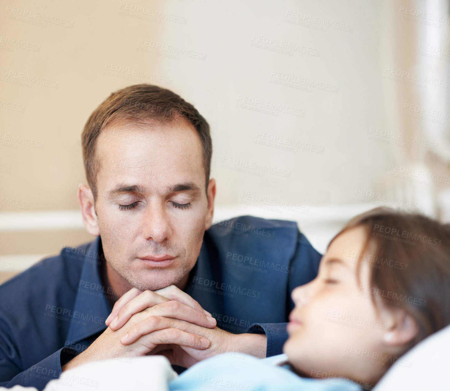 Buy stock photo Sick child, hospital bed and father with prayer, care and support for healing with healthcare. Illness, girl and parent praying in clinic for rehabilitation, faith and hope for medical recovery