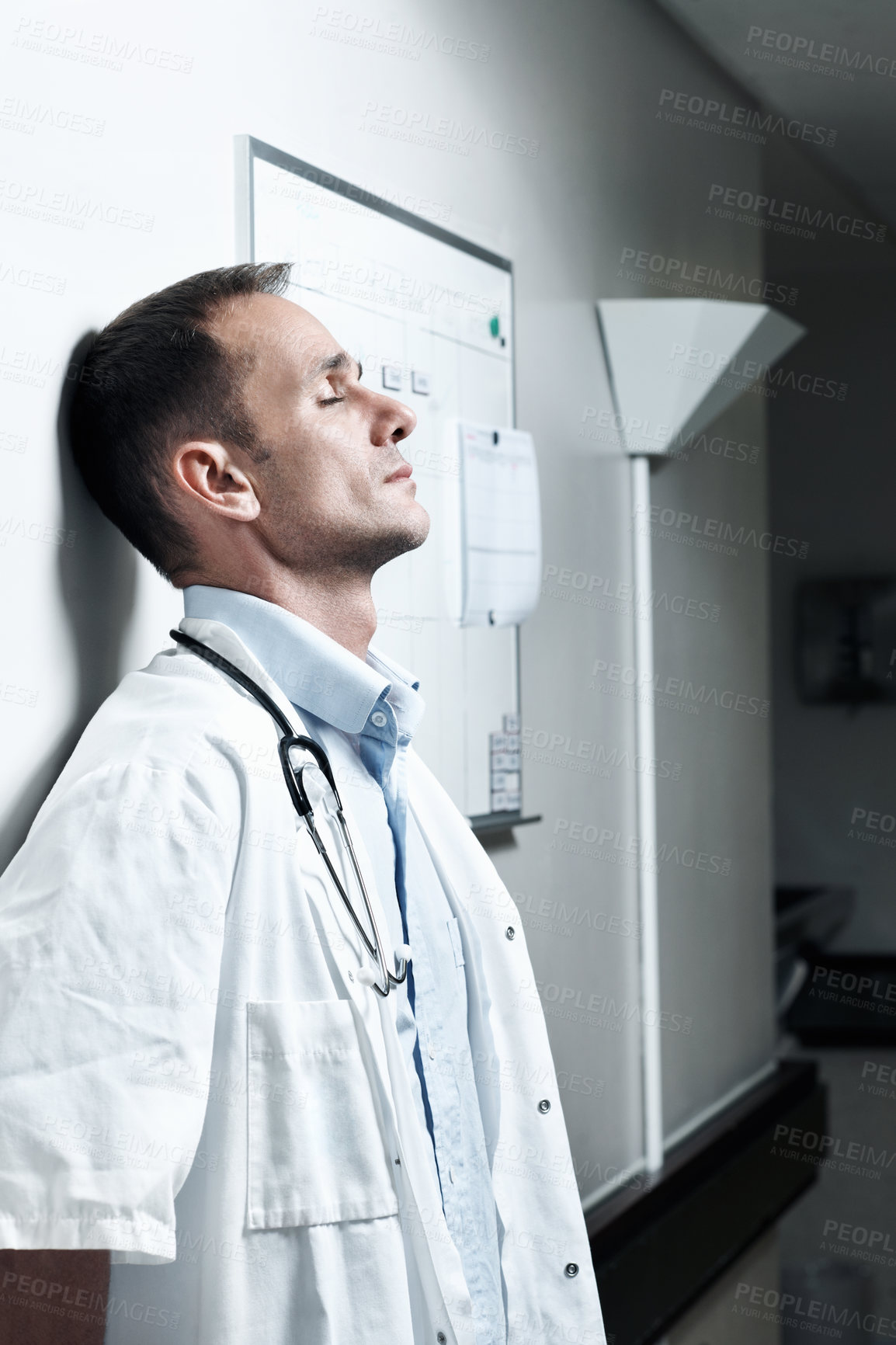Buy stock photo Doctor, burnout and thinking with man in hospital for medical fail, reflection and emergency risk. Healthcare, career sad and perspective with person with depression in hallway in clinic for error