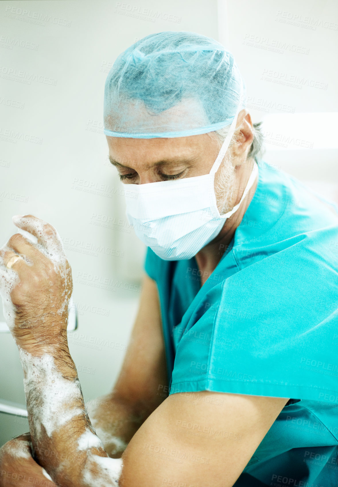 Buy stock photo Hygiene, soap or surgeon with scrub in hospital for surgery preparation, medical safety or PPE. Mature man, doctor and washing hands for disinfection, sterile procedure or getting ready for operation