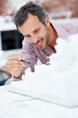 Buy stock photo Architecture, inspection and man in office with structure, building design and model for planning. Creative, business and person with 3d layout for blueprint, prototype and project for construction