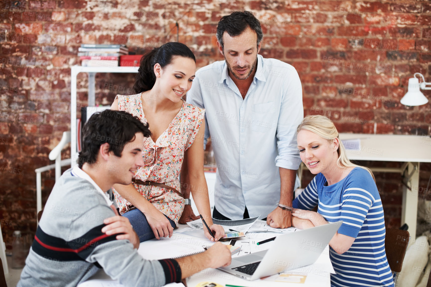 Buy stock photo Team, laptop and reading with business people in office for planning, interior design pitch and feedback. Digital decor rendering, client briefing and meeting with employees in agency for research