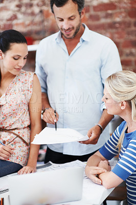 Buy stock photo Team, laptop and documents with business people in office for planning, interior design pitch and feedback. Digital decor rendering, client briefing and meeting with employees in agency for research