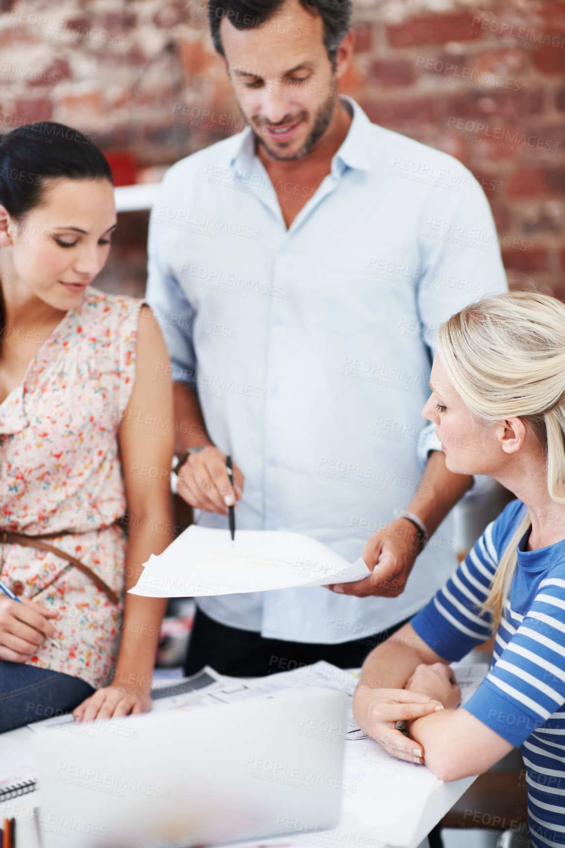 Buy stock photo Team, laptop and documents with business people in office for planning, interior design pitch and feedback. Digital decor rendering, client briefing and meeting with employees in agency for research