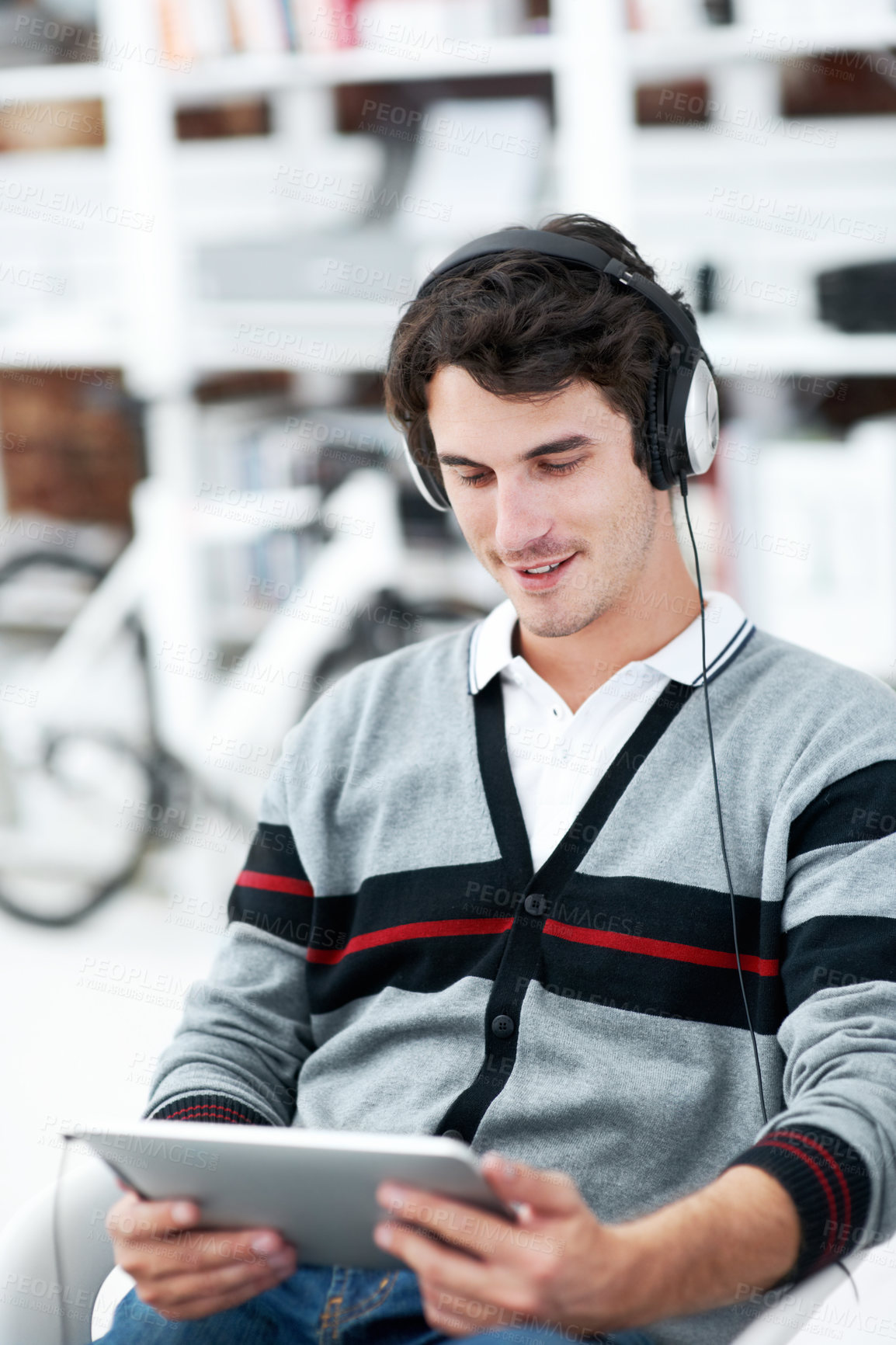 Buy stock photo Headphones, tablet and smile with business man in office for web developer, research and planning. Logo design, creative project and music with person online in startup agency for branding update