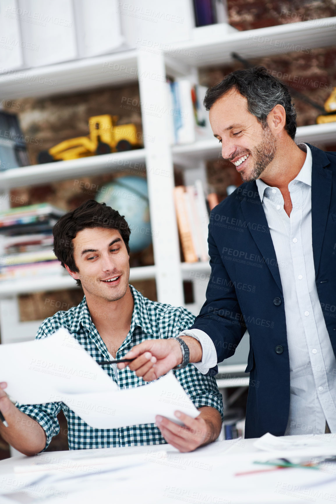 Buy stock photo Business, men and architect in meeting with documents, blueprint and policy for architecture. Smile, team and reading in workplace with paperwork, floor plan and information for building development