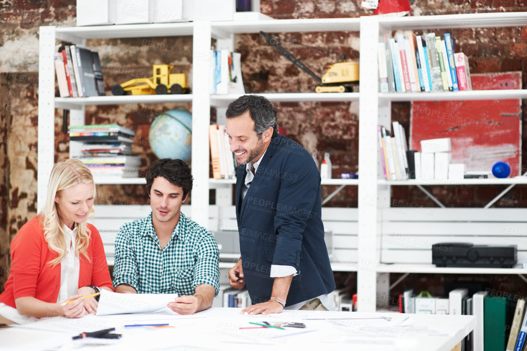 Buy stock photo Architect, meeting and team with business people in office for idea, property or building proposal. Floor plan, blueprint or real estate layout with employees and documents for  design project