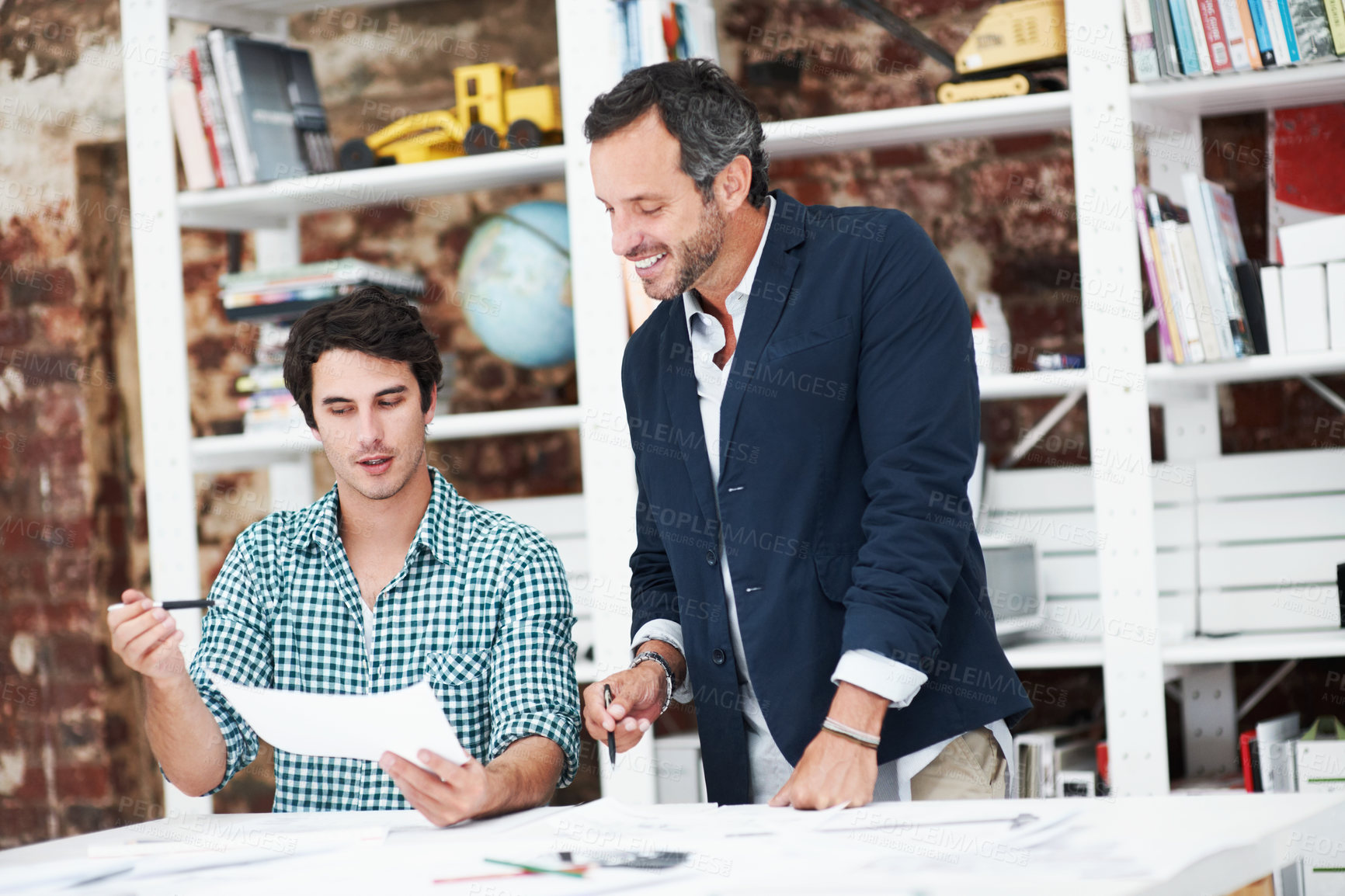 Buy stock photo People, architect and talk in meeting with document, blueprint and planning for architecture. Smile, team and discussion in office with paperwork, floor plan and information for building development