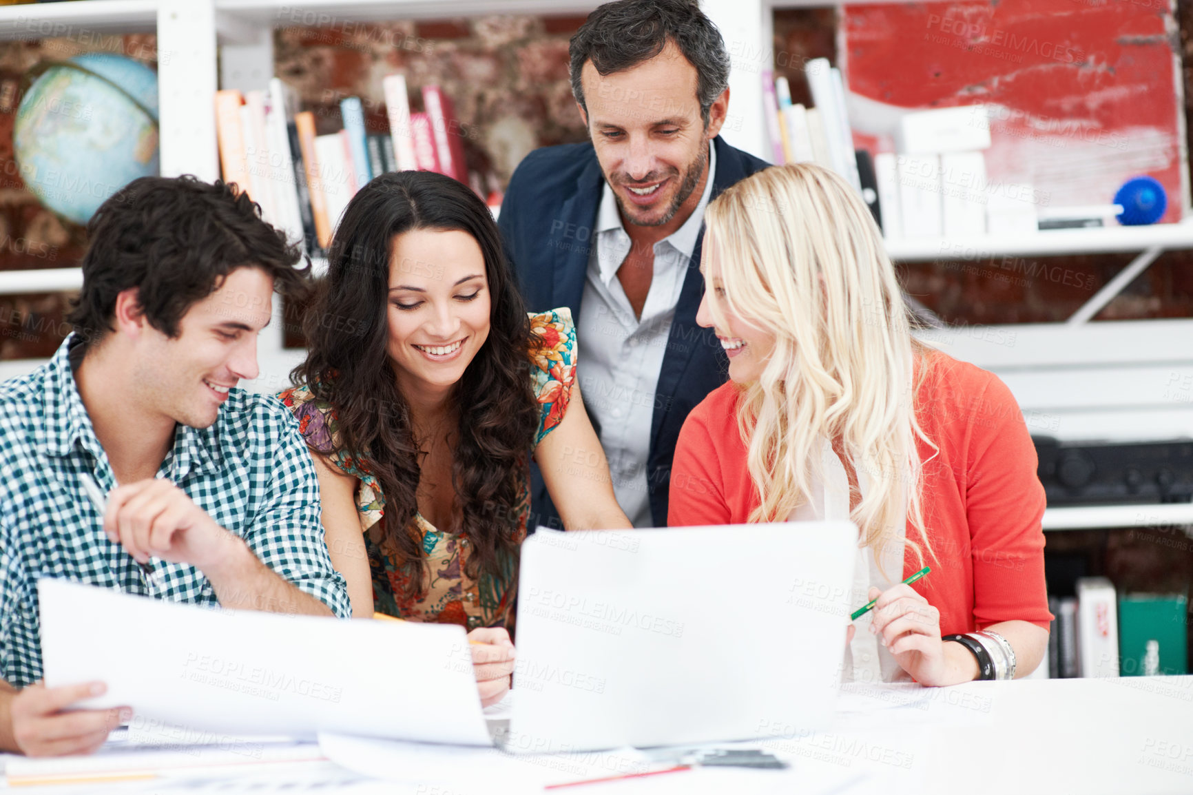 Buy stock photo Laptop, meeting and documents with business people in office for interior design briefing, review and team. Architect project timeline, collaboration and floor plan pitch with employees in agency