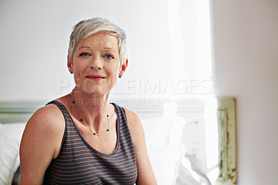 Buy stock photo Portrait of a smiling mature woman at home