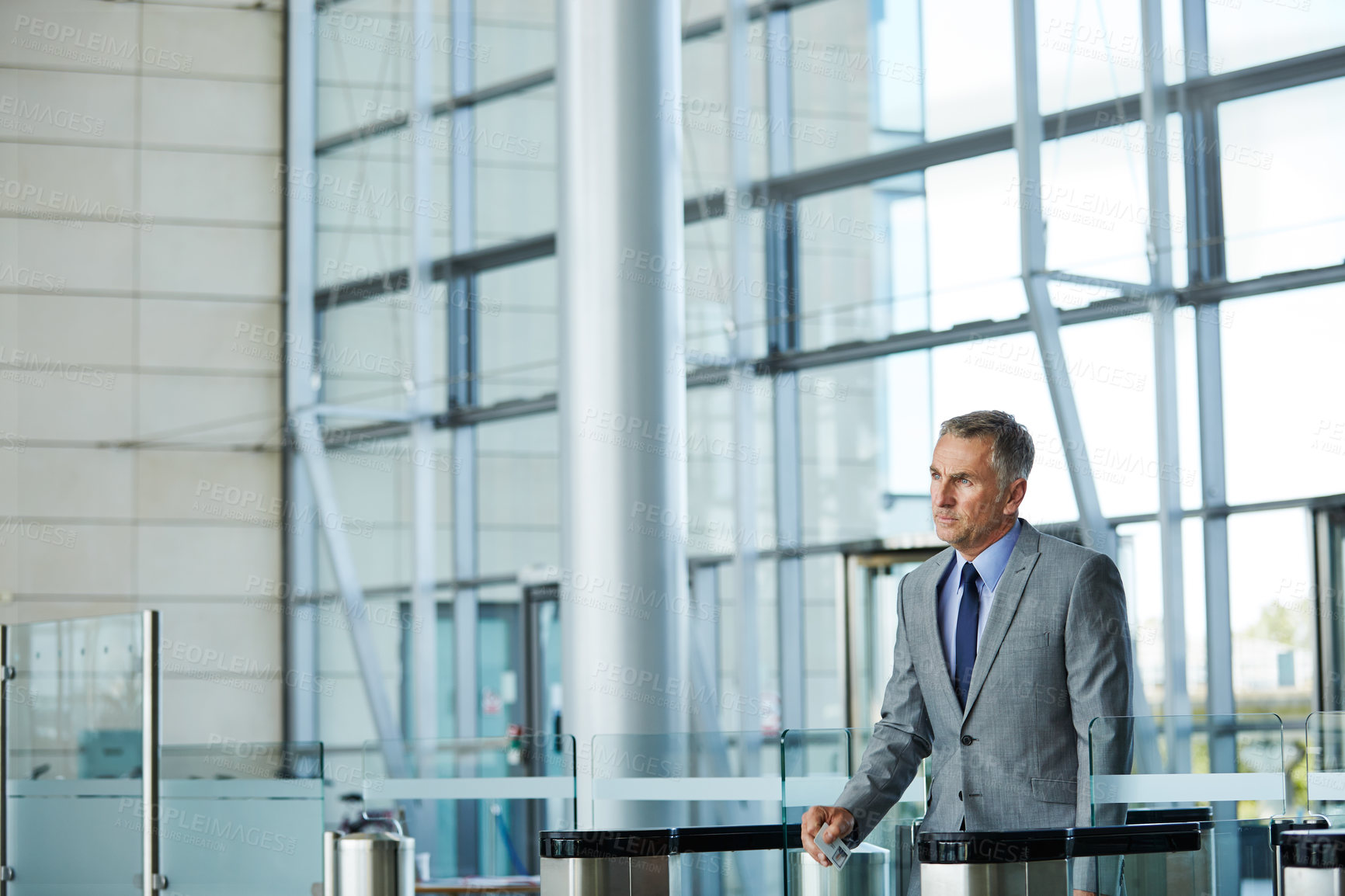 Buy stock photo Entry, access and business man in office, workplace and arrive for work, conference or career. Corporate, walking and person with scan, id card and arrival for building security, entrance and lobby