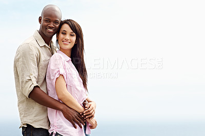 Buy stock photo Portrait of an affectionate couple enjoying a day outside together