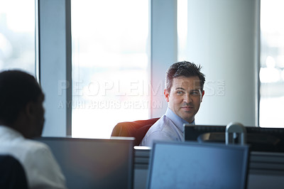 Buy stock photo Shot of two businessmen talking in the office