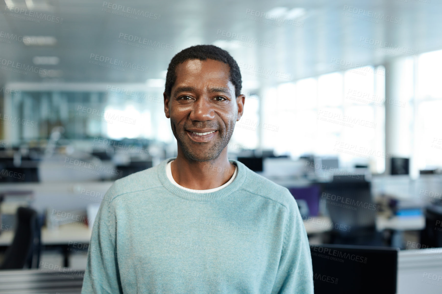 Buy stock photo Portrait of a businessman standing in his office