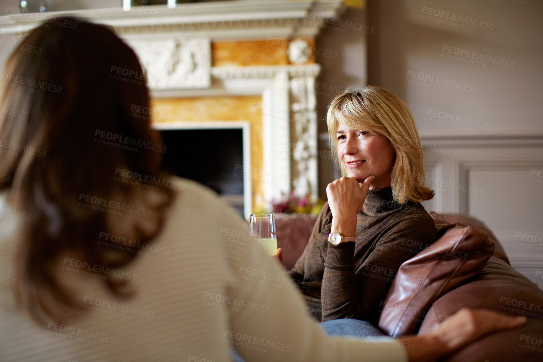 Buy stock photo Listening, relax and senior mother with daughter on sofa in home for bonding, support and love. Discussion, trust and connection with women in living room in family house for care, advice and gossip