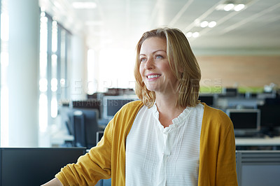 Buy stock photo Shot of a smiling woman standing in an office