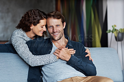 Buy stock photo Portrait of an affectionate mature couple in their living room