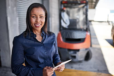 Buy stock photo Portrait of a warehouse manager holding a digital tablet