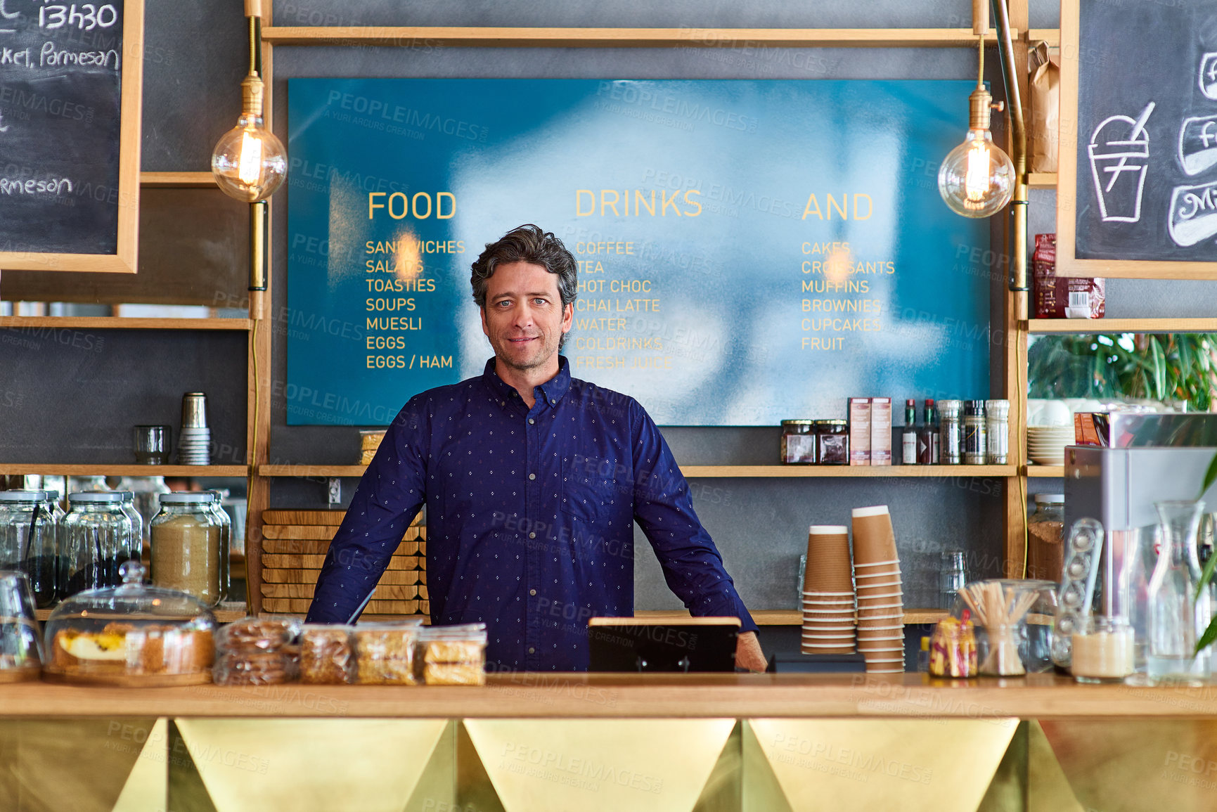 Buy stock photo Hospitality, portrait or owner in cafe with smile, career pride or about us in bistro business. Happy, man or mature coffee shop manager with confidence, food service or ambition in culinary industry