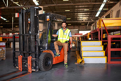 Buy stock photo Portrait of smiling forklift operator in a large warehouse
