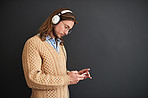Queuing up his next tune