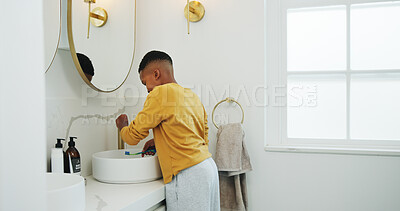 Buy stock photo Boy, child and toothbrush in bathroom with tap water, dental health and morning routine for wellness. Kid, hygiene and basin in home for brushing teeth, getting ready and oral care for fresh breath.