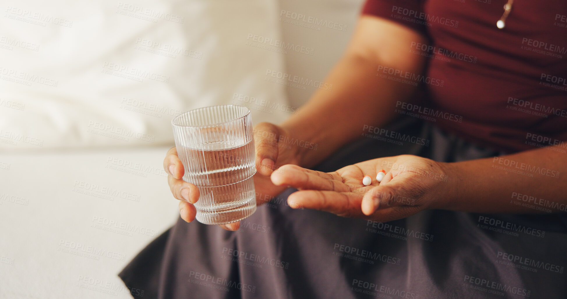 Buy stock photo Medical, water and hands in house with pills, symptoms management or prescription in health routine. Wellness, dose or woman with glass, treatment plan or illness recovery in pharmaceutical care.