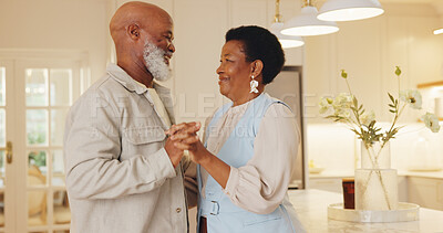 Buy stock photo Dancing, happy and black couple in kitchen at house with music for bonding, love and connection together. Smile, marriage and mature people for moving to romantic playlist on weekend in home.