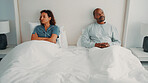 Angry, couple and woman with arms crossed in bedroom, thinking and fight with partner on bed in home. Mature African people, reflection and contemplating divorce in house, marriage crisis or conflict