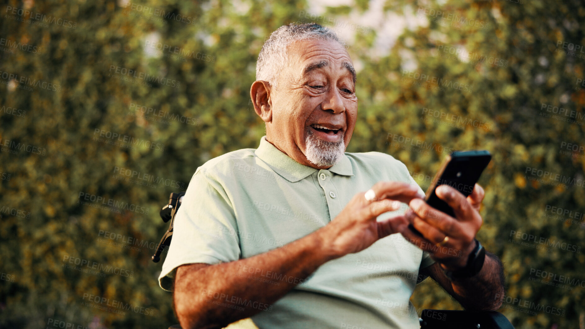 Buy stock photo Texting, phone and old man outdoor with wheelchair, online communication and comic post on social media. Laugh, digital and senior person with disability, funny message or meme reaction on chat app.