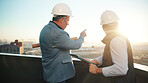 Architect, tablet and team pointing on rooftop for discussion, real estate development or flare. Tech, construction or men planning in city, property project or show building with sunshine from back