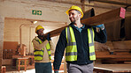 Smile, teamwork and men in warehouse for woodwork, manufacturing and lumber contractor. Furniture, production and carpenter people in joinery factory with beam for workshop, collaboration or project