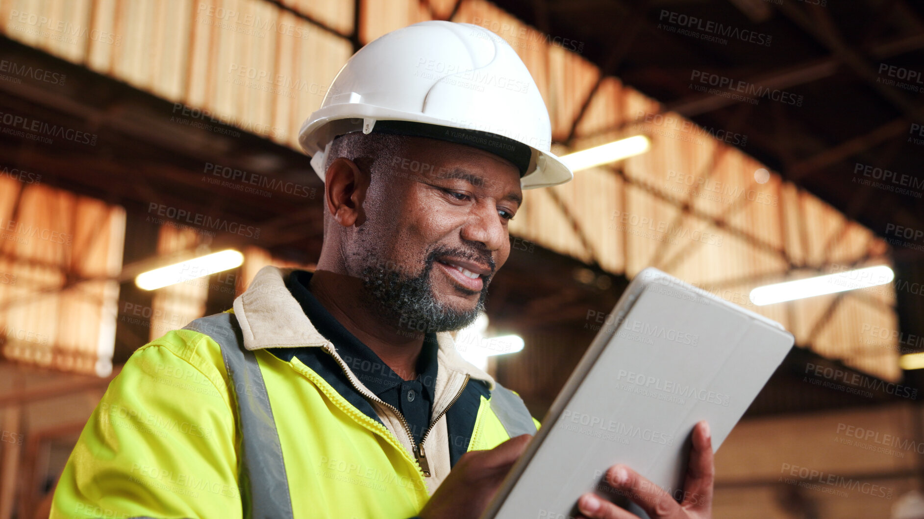 Buy stock photo Architect, reading and happy man with tablet on construction site, research and property development. Mature civil engineer, smile and black person with tech, online and building renovation on web
