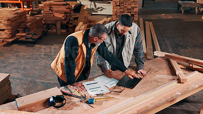 Buy stock photo Men, laptop and paperwork in lumber workshop, carpenter and team with discussion for invoice in woodwork. Conversation, collaboration and people with tech for online order or carpentry planning