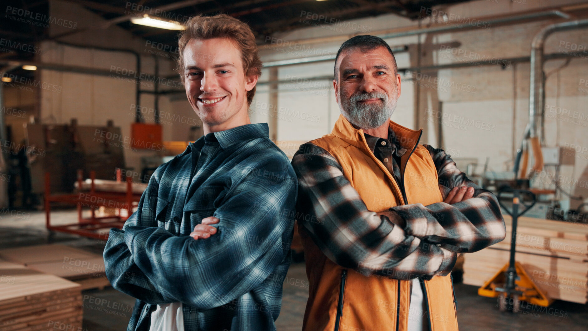 Buy stock photo Portrait, arms crossed and men in lumber workshop, carpentry apprentice and mentor in manufacturing. People, team confidence and smile with carpenter trainee, supervisor and woodworking production