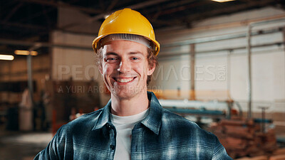 Buy stock photo Carpentry, portrait and happy man in factory with helmet, handyman or ambition in manufacturing industry. Smile, hardhat or carpenter with about us, production career or confidence in woodworking.
