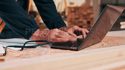 Buy stock photo Carpentry, hands and man on laptop in workshop for planning, schedule or manufacturing quote. Warehouse, male person or carpenter with technology for woodwork or furniture production with research