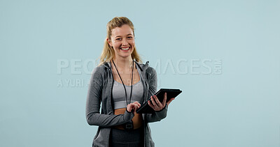 Buy stock photo Fitness, portrait and woman with tablet in studio, health and happy coach on blue background. Technology, female person and personal trainer with smile for exercise guide, pride and mockup space