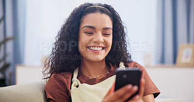 Buy stock photo Smile, relax and woman on sofa with phone for texting, notification or online dating app in home. Communication, connection and happy person in living room with tech for social media, message or chat