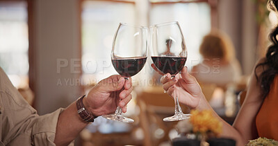Buy stock photo Couple, toast or hands in restaurant with red wine, loyalty or bonding in anniversary celebration. Honeymoon, commitment or people with alcohol cheers, special moment or connection with romantic date