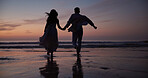 Couple, running and holding hands at beach with silhouette, travel and romantic date on holiday. Back, sunset and people at seashore with partner, celebration and tropical vacation for adventure trip