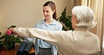 Happy, physiotherapist and old woman with dumbbell, stretching or workout routine to improve posture. Physical therapy, rehabilitation and support for senior person, fitness and exercise for wellness
