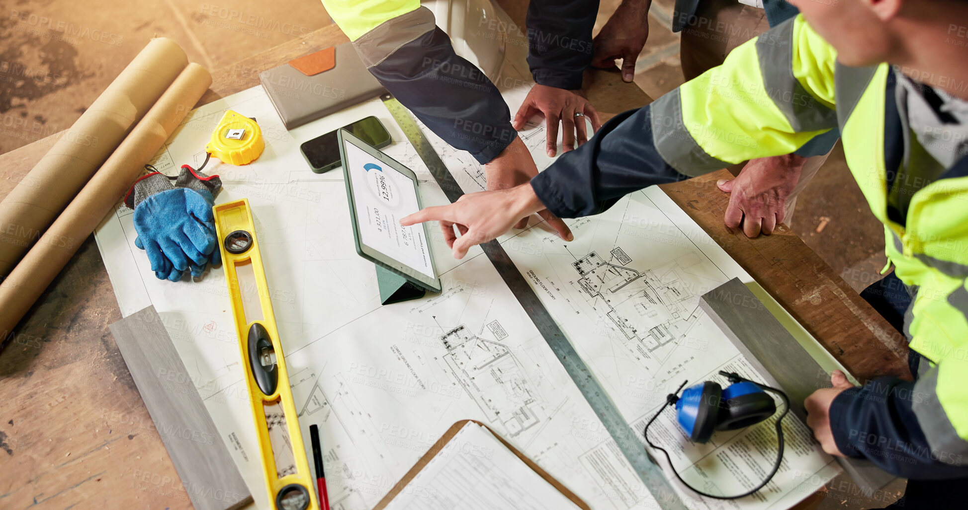 Buy stock photo Hands, team and blueprint with tablet screen for architecture, project management and pointing. Above, engineer people and floorplan with tech for stock pricing, design evaluation or brainstorming