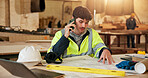 Architect, blueprint and man on phone call for communication, planning and woodwork advice. Engineer, floor plan and technology for feedback, process and discussion for custom carpentry at warehouse