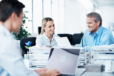 Buy stock photo Business people, coworking or meeting with documents in office, man and laptop with happy project discussion. Paperwork, team or colleagues with smile for proposal review or check report with tech