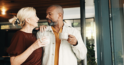 Buy stock photo Coffee, home or window with couple for morning conversation, romance or love together. Interracial relationship, mature man or woman talking with cup or mug of caffeine for beverage or break in house
