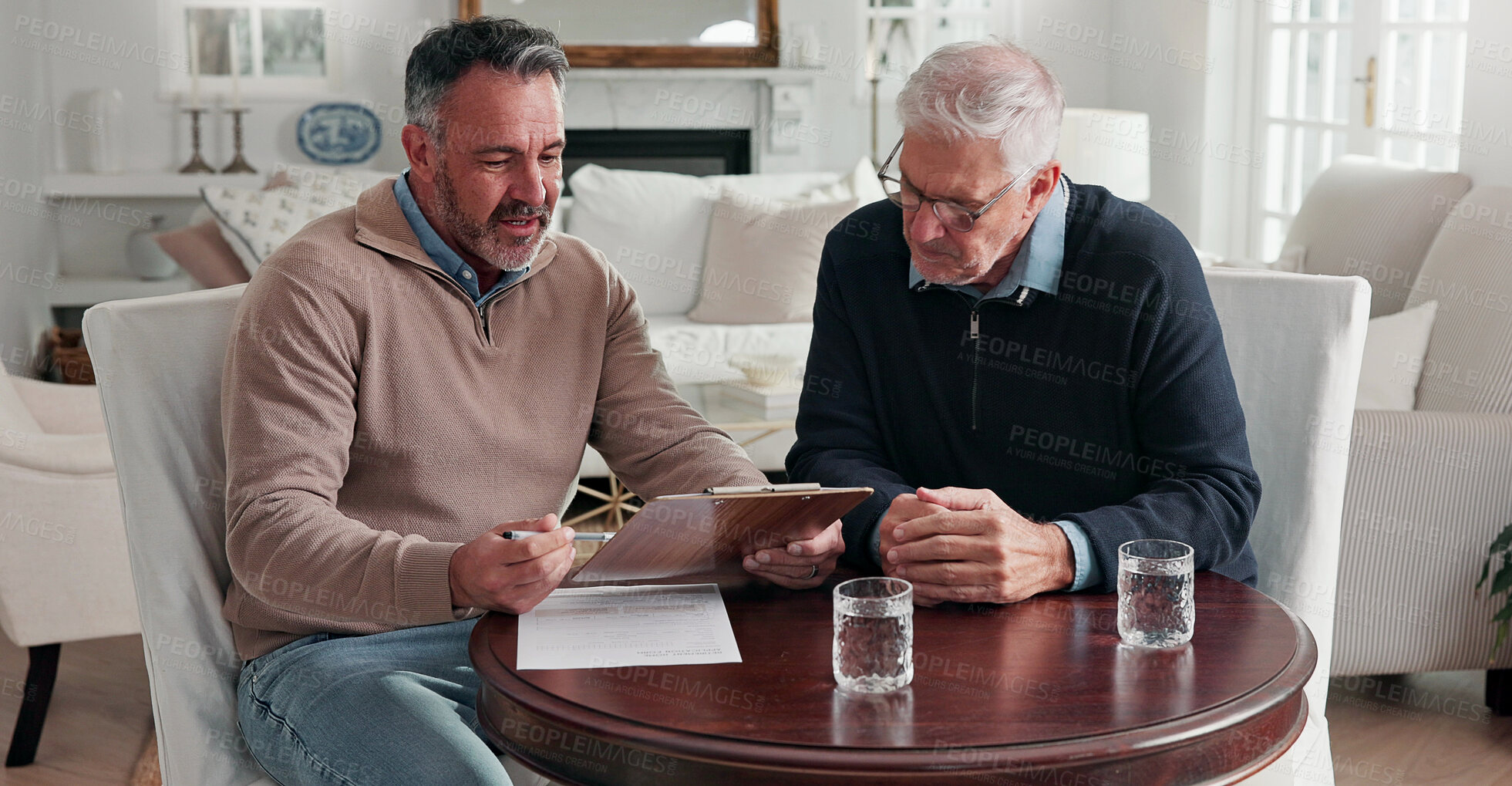 Buy stock photo Advisor, meeting and old man in home with clipboard, finance report and document for consent form. Consultant, senior person and checklist with paperwork, financial information and loan application
