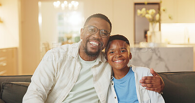 Buy stock photo Happy, portrait and child with father on sofa in home for bonding, love and connection on weekend. Smile, relax and African boy kid with dad in living room for care, safety or trust together in house