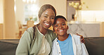 Happy, portrait and mother with child on sofa in home for bonding, love and connection on weekend. Smile, relax and African boy kid with mom in living room for care, safety or hug together in house.
